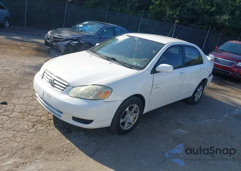 2004 Toyota Corolla Le z USA, uszkodzony, nr VIN JTDBR32EX42044932